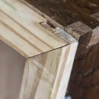 Showing exposure of the door frame rabbet through the joint